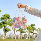 Hand woven woolen Crochet bag with puff flowers women 2020 new creative chrysanthemum messenger bag